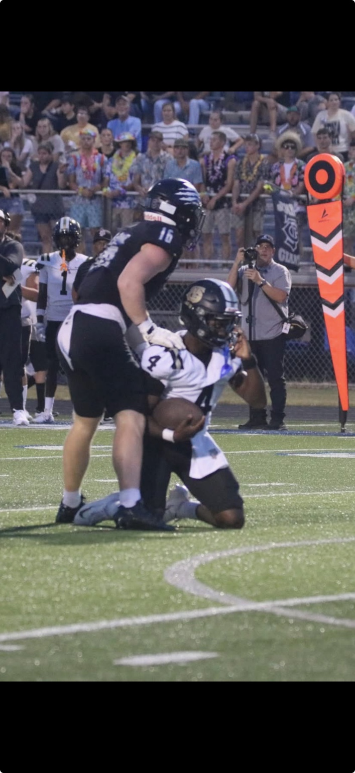 Ashton Bradford football photo: Sideline tackle